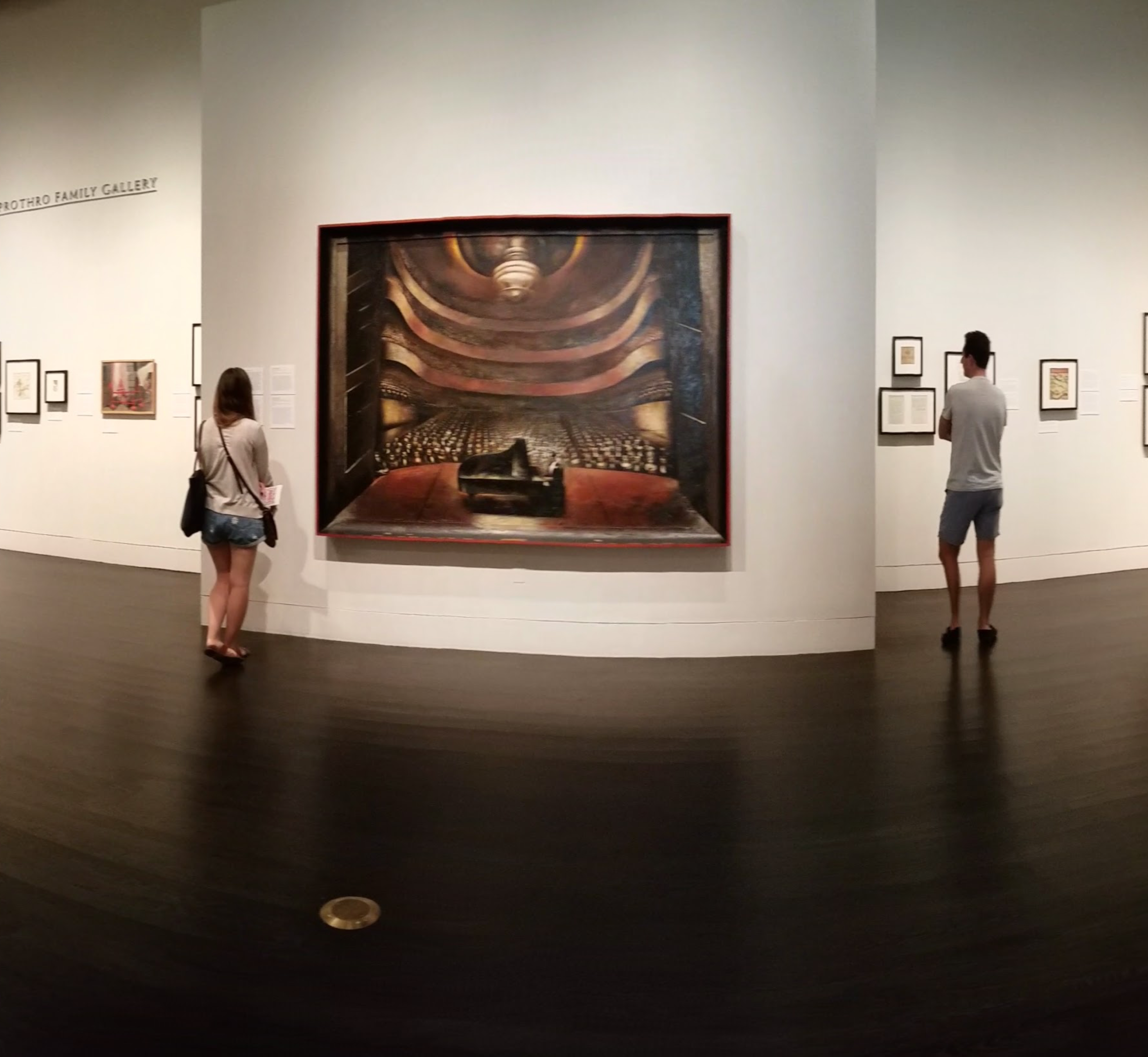 Two people looking at a museum exhibit